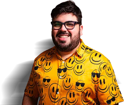 Bruno UAU sorrindo de camisa amarela de smileys